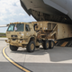 THAAD missile launcher being loaded on a U.S. Air Force C-17 transport.